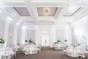 Grand ballroom interior at Ballroom at Ellis Preserve Newtown Square set for a wedding reception