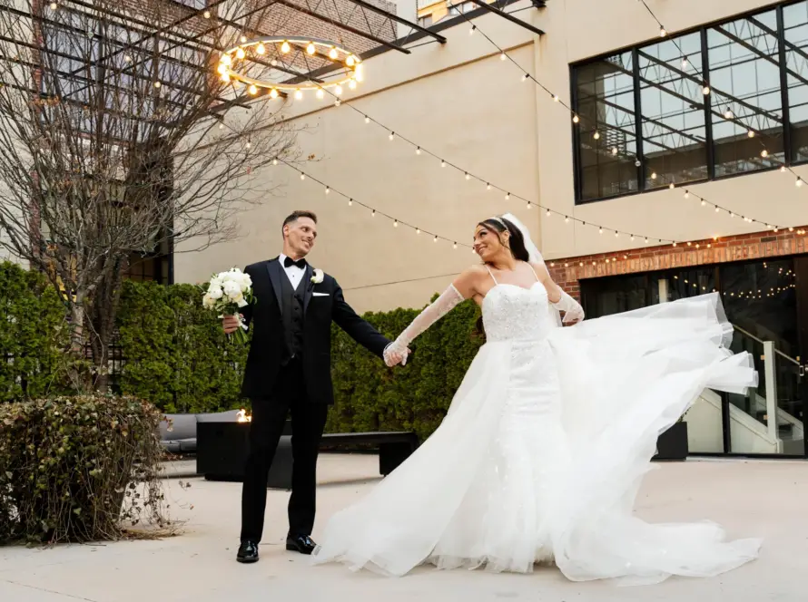 Bride and groom dancing in the outdoor courtyard at VIE in Philadelphia