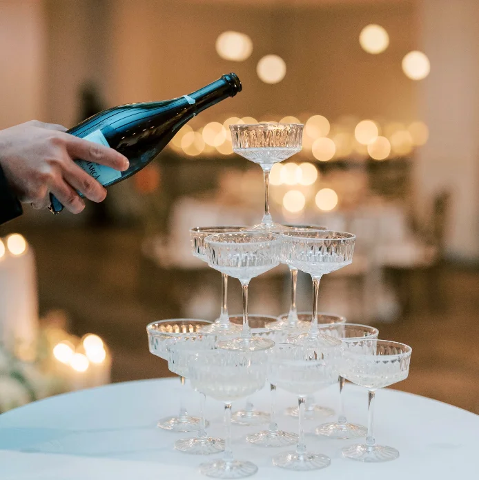 Champagne tower at a wedding at The Grand Belle at the Bellevue Hotel