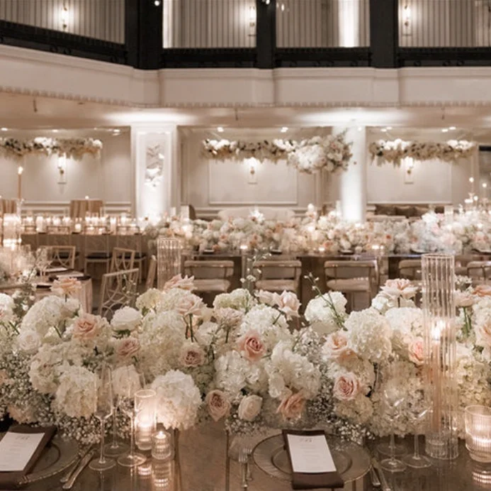 Floral wedding reception tablescape at The Grand Belle at the Bellevue Hotel