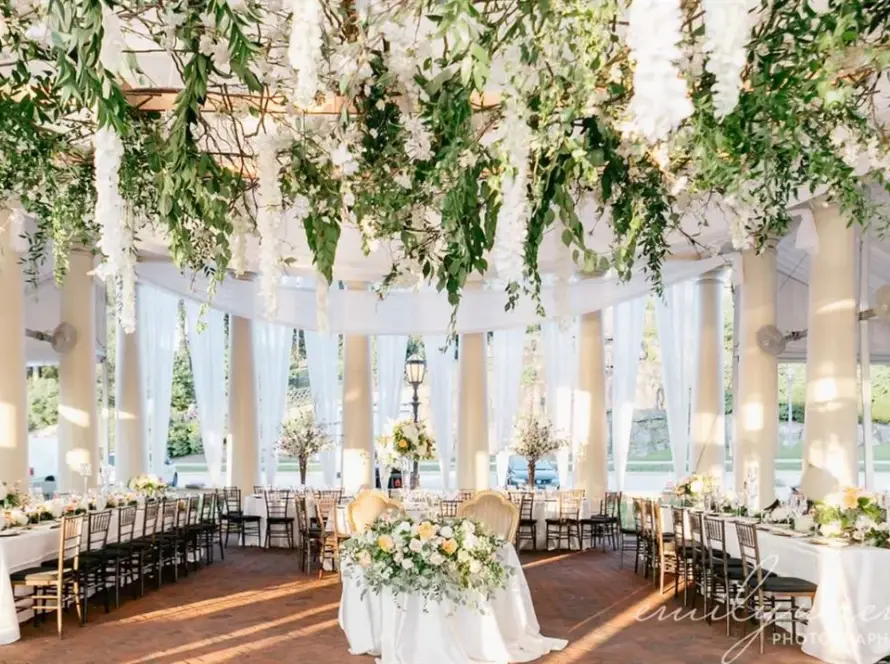 Wedding reception under hanging greenery and columns at Water Works by Cescaphe in Philadelphia